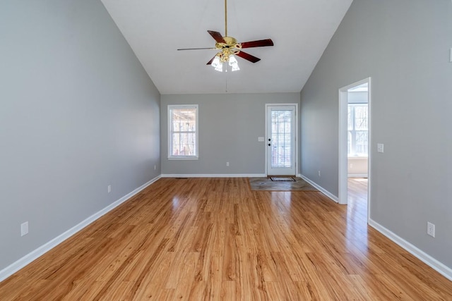 55 Bluebird Ln, Lafayette, TN 37083 - entryway featuring a ceiling fan, light wood-style flooring, baseboards, and high vaulted ceiling