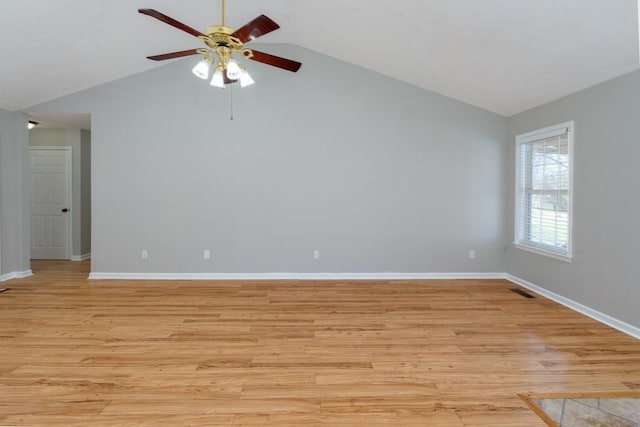 55 Bluebird Ln, Lafayette, TN 37083 - spare room with lofted ceiling, a ceiling fan, light wood finished floors, and baseboards