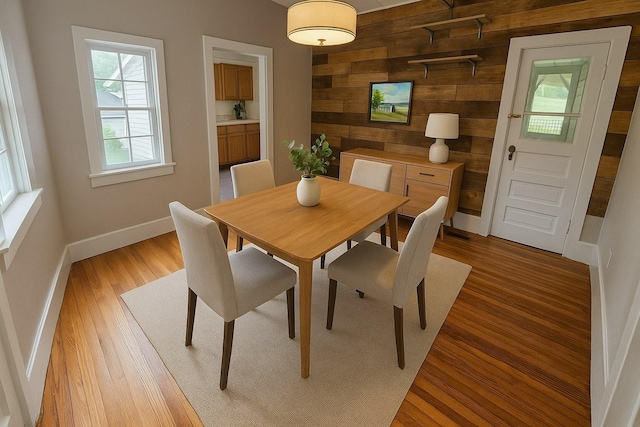 1105 Normandy Rd, Normandy, TN 37360 - dining room with wood walls, baseboards, and light wood-style floors