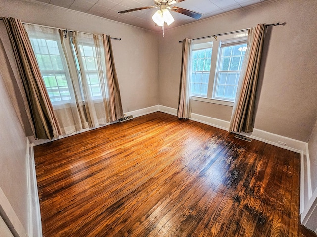1105 Normandy Rd, Normandy, TN 37360 - spare room with wood-type flooring, a ceiling fan, crown molding, and baseboards