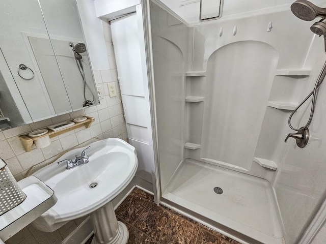 1105 Normandy Rd, Normandy, TN 37360 - bathroom with a shower stall, marble finish floors, and tile walls