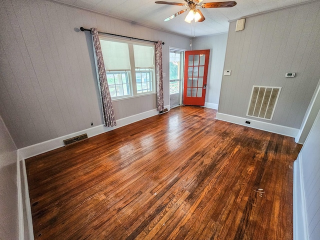1105 Normandy Rd, Normandy, TN 37360 - spare room with ceiling fan, wood finished floors, wood walls, and baseboards