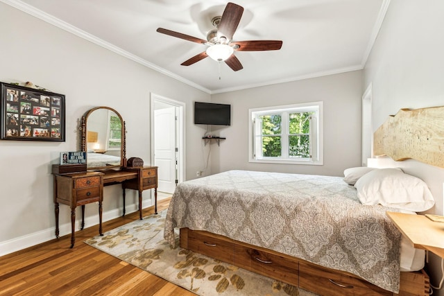 1064 Bills Ln, Joelton, TN 37080 - bedroom featuring wood finished floors, ornamental molding, ceiling fan, and baseboards