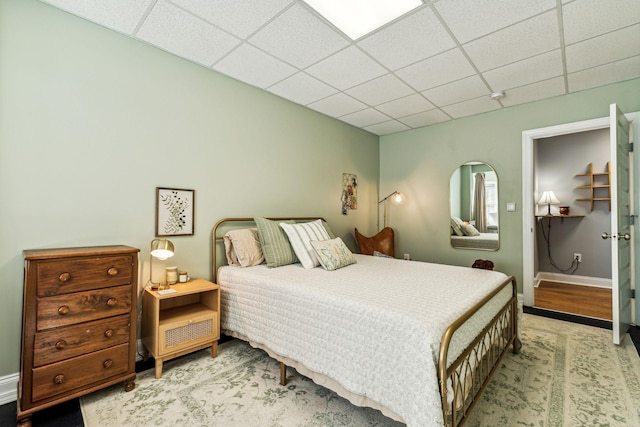 1064 Bills Ln, Joelton, TN 37080 - bedroom featuring a paneled ceiling and baseboards