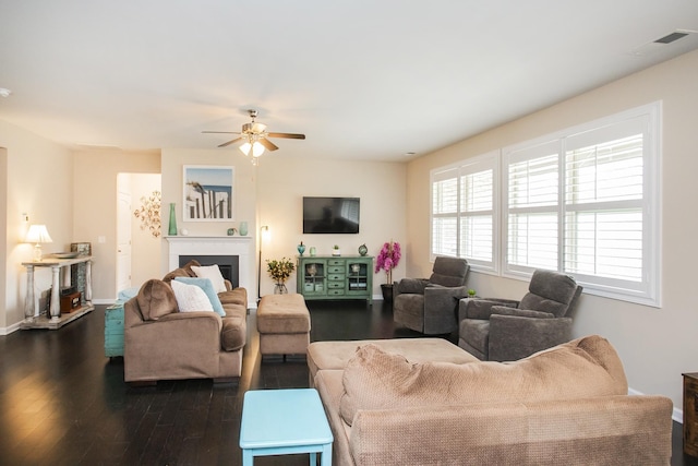 8023 Forest Hills Dr, Spring Hill, TN 37174 - living area with dark wood-style floors, a ceiling fan, a fireplace, and baseboards