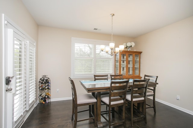 8023 Forest Hills Dr, Spring Hill, TN 37174 - dining area with a chandelier, dark wood-type flooring, and baseboards