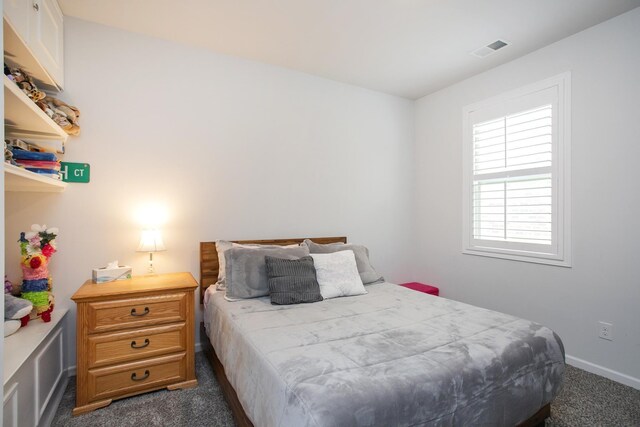 8023 Forest Hills Dr, Spring Hill, TN 37174 - bedroom with dark carpet and baseboards