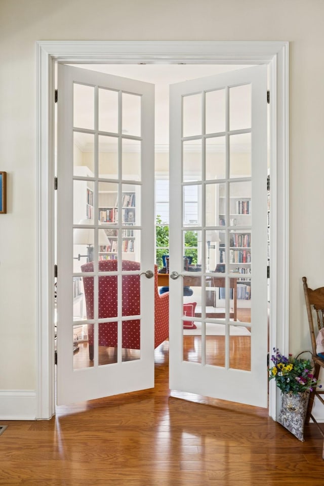 3007 General Martin Ln, Franklin, TN 37064 - doorway to outside with french doors, wood finished floors, and baseboards