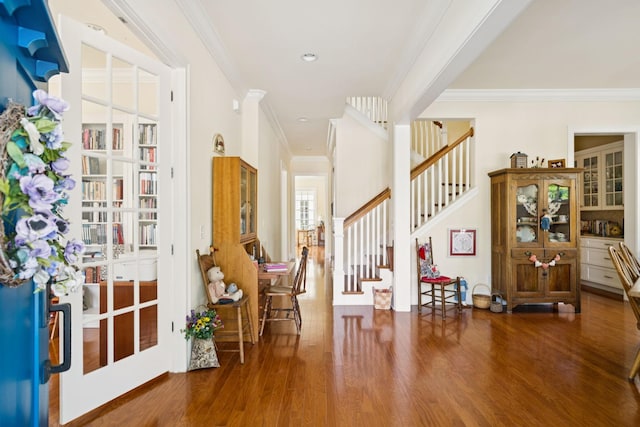 3007 General Martin Ln, Franklin, TN 37064 - foyer entrance with wood finished floors, crown molding, and stairs