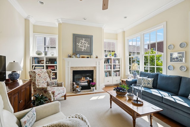 3007 General Martin Ln, Franklin, TN 37064 - living room featuring wood finished floors, a ceiling fan, crown molding, a fireplace with flush hearth, and recessed lighting
