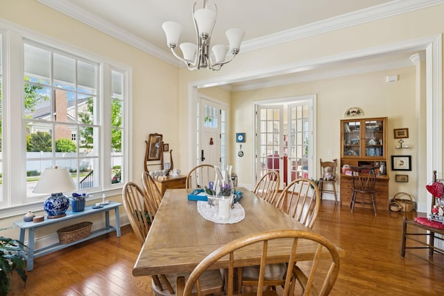 3007 General Martin Ln, Franklin, TN 37064 - dining room with wood finished floors, crown molding, and a chandelier