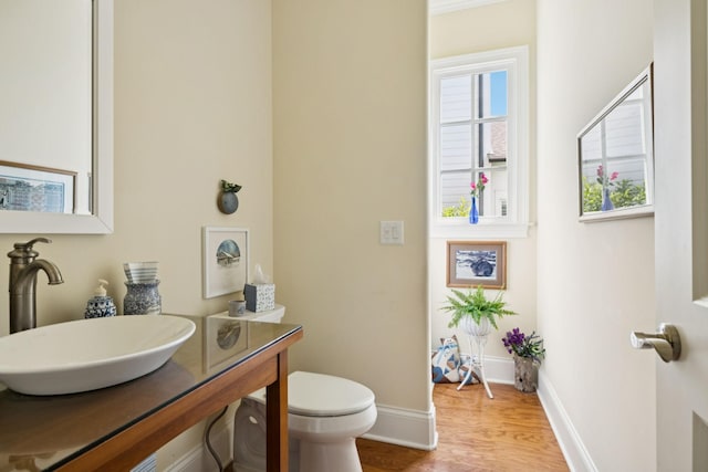 3007 General Martin Ln, Franklin, TN 37064 - bathroom with toilet, wood finished floors, baseboards, and vanity