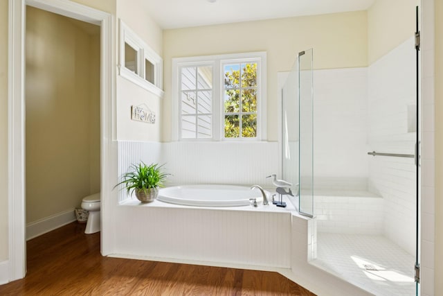 3007 General Martin Ln, Franklin, TN 37064 - full bathroom featuring toilet, a bath, a tile shower, and wood finished floors