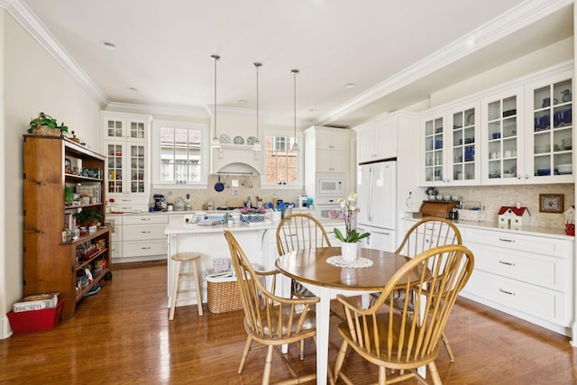 3007 General Martin Ln, Franklin, TN 37064 - dining room with crown molding, wood finished floors, and recessed lighting