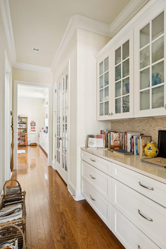 3007 General Martin Ln, Franklin, TN 37064 - corridor with dark wood-type flooring, crown molding, and french doors
