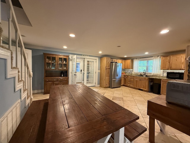 1650 E Beaverdam Rd, Centerville, TN 37033 - kitchen with freestanding refrigerator, a sink, ornamental molding, recessed lighting, and french doors