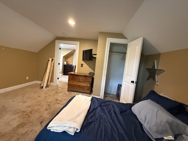 1650 E Beaverdam Rd, Centerville, TN 37033 - carpeted bedroom with vaulted ceiling, baseboards, and a closet