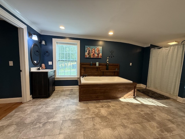 1650 E Beaverdam Rd, Centerville, TN 37033 - full bathroom with crown molding, baseboards, a garden tub, vanity, and recessed lighting