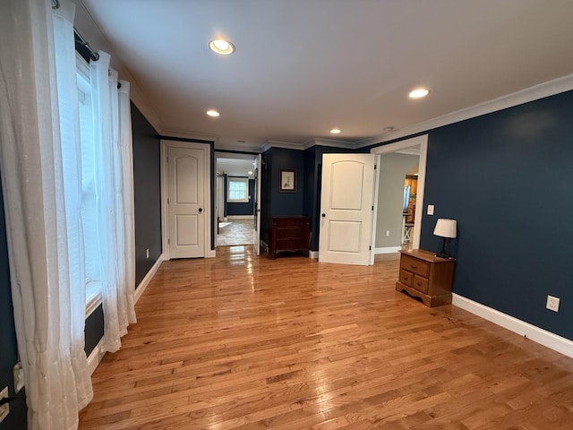 1650 E Beaverdam Rd, Centerville, TN 37033 - unfurnished bedroom featuring crown molding, baseboards, light wood-style floors, and recessed lighting
