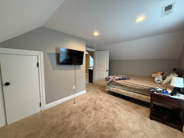 1650 E Beaverdam Rd, Centerville, TN 37033 - bedroom with lofted ceiling, light colored carpet, and baseboards