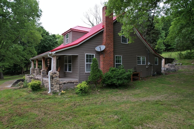 1650 E Beaverdam Rd, Centerville, TN 37033 - view of property exterior featuring a chimney and a yard