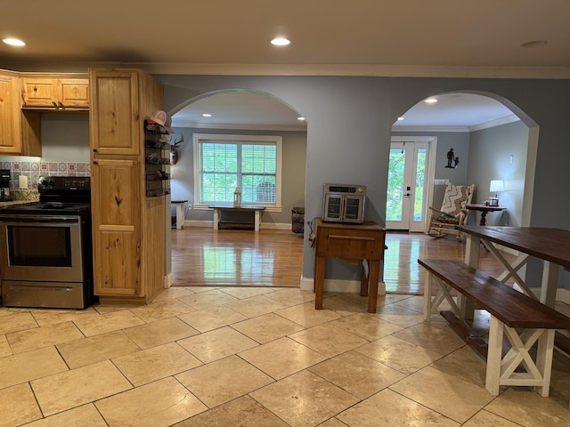1650 E Beaverdam Rd, Centerville, TN 37033 - kitchen featuring electric range, ornamental molding, healthy amount of natural light, recessed lighting, and tasteful backsplash