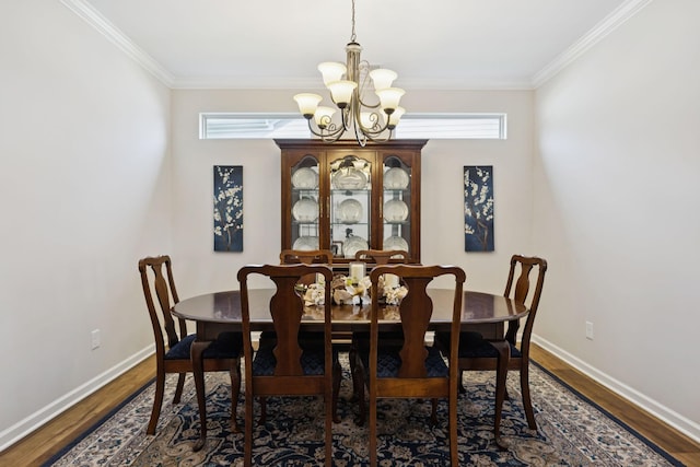 1045 Brayden Dr, Fairview, TN 37062 - dining room with a chandelier, ornamental molding, dark wood-type flooring, and baseboards