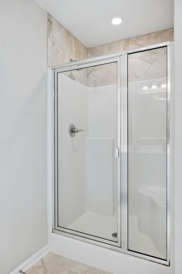 1045 Brayden Dr, Fairview, TN 37062 - bathroom featuring a shower stall and baseboards