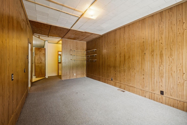1319 Main St N, Carthage, TN 37030 - carpeted spare room featuring wooden walls