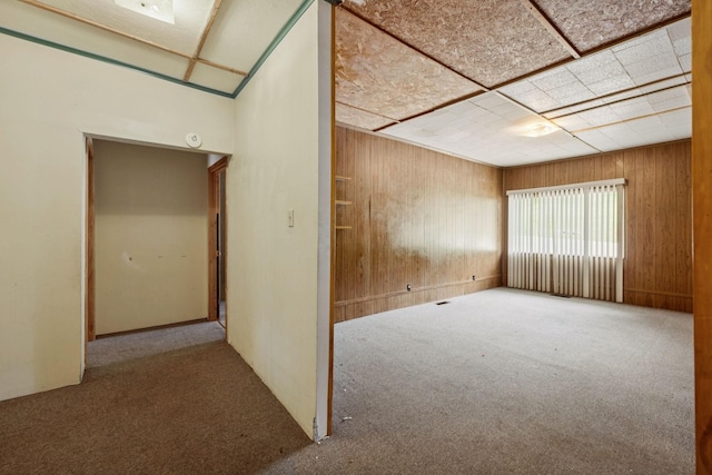 1319 Main St N, Carthage, TN 37030 - carpeted empty room featuring wooden walls
