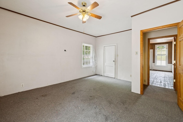 1319 Main St N, Carthage, TN 37030 - unfurnished room featuring carpet flooring, ceiling fan, and ornamental molding