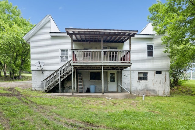 1319 Main St N, Carthage, TN 37030 - rear view of house featuring a deck, stairs, a yard, and a patio