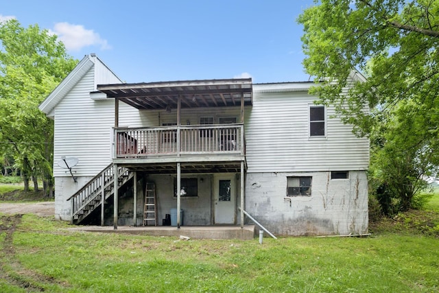 1319 Main St N, Carthage, TN 37030 - rear view of property with stairs, a lawn, and a wooden deck