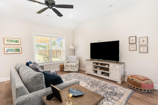 3019 Easy Goer Ln, Greenbrier, TN 37073 - living room featuring baseboards, light wood-style floors, ceiling fan, and lofted ceiling
