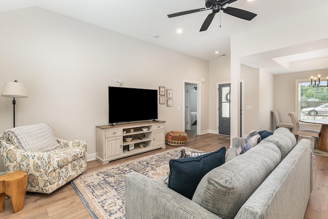 3019 Easy Goer Ln, Greenbrier, TN 37073 - living area featuring light wood-style flooring, a ceiling fan, a chandelier, and recessed lighting