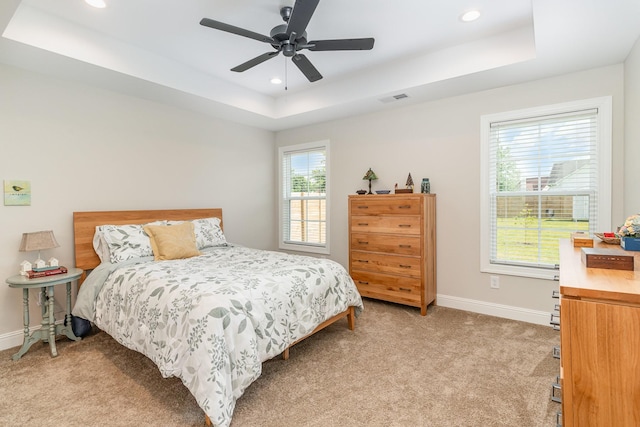 3019 Easy Goer Ln, Greenbrier, TN 37073 - bedroom featuring light carpet, baseboards, a raised ceiling, recessed lighting, and a ceiling fan