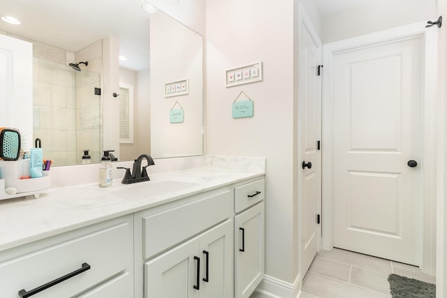 3019 Easy Goer Ln, Greenbrier, TN 37073 - bathroom featuring vanity, tile patterned floors, recessed lighting, and a tile shower