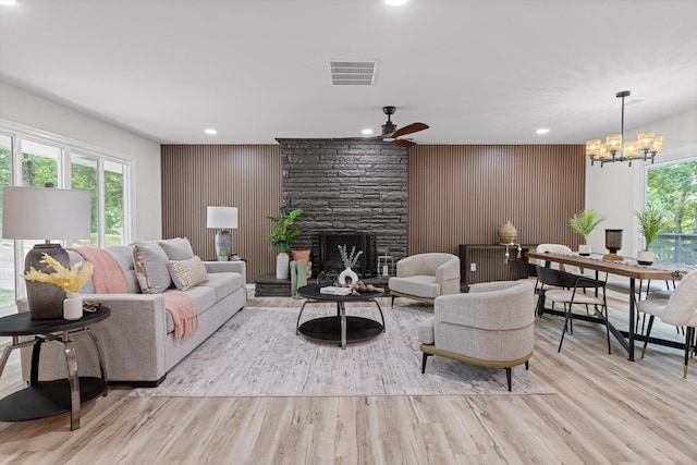 2605 Avalon Hl, Chattanooga, TN 37415 - living room with wood finished floors, a ceiling fan, recessed lighting, a chandelier, and a fireplace