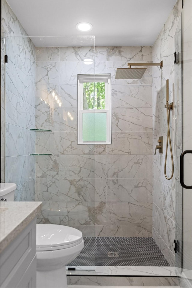 2605 Avalon Hl, Chattanooga, TN 37415 - bathroom featuring toilet, vanity, and a marble finish shower
