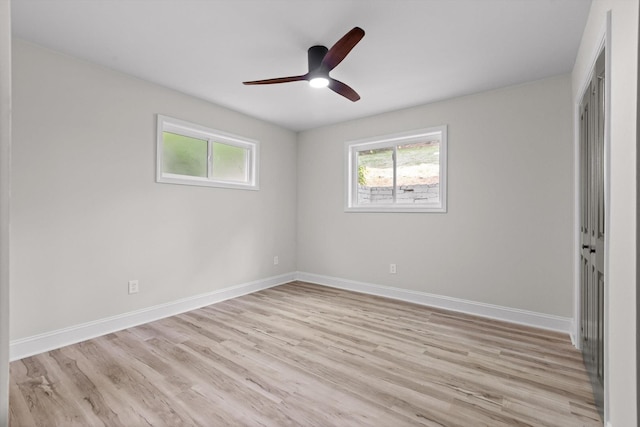 2605 Avalon Hl, Chattanooga, TN 37415 - unfurnished bedroom with light wood-type flooring, baseboards, and a ceiling fan