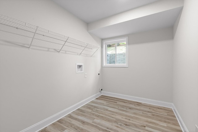 2605 Avalon Hl, Chattanooga, TN 37415 - washroom with washer hookup, light wood-type flooring, baseboards, and hookup for an electric dryer