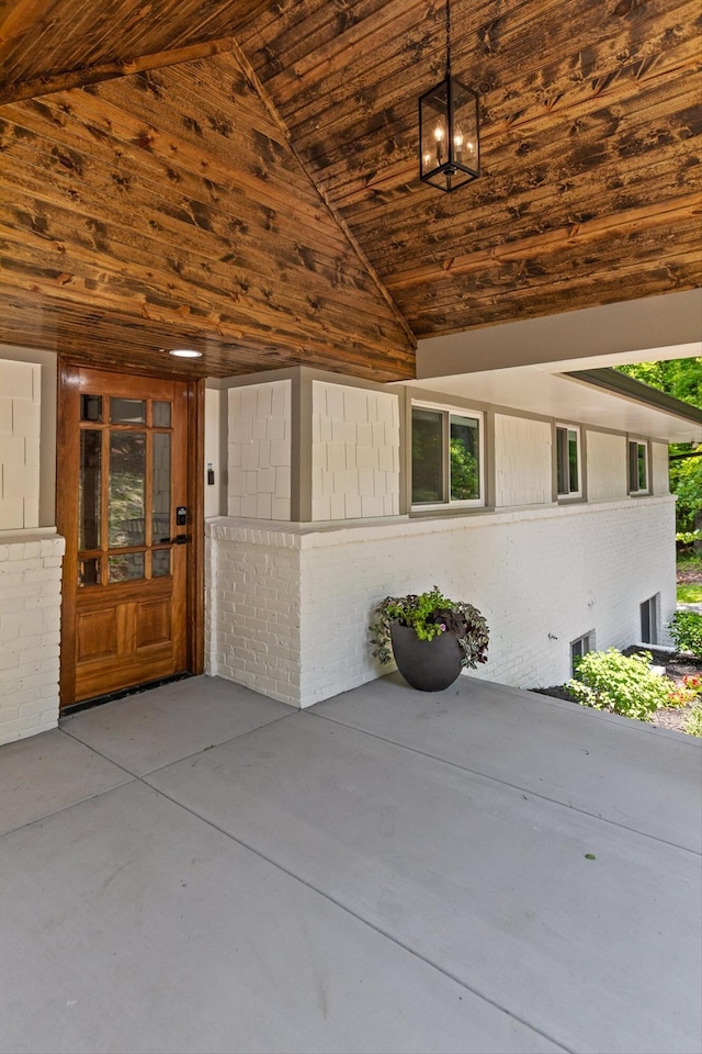 2605 Avalon Hl, Chattanooga, TN 37415 - view of exterior entry with brick siding and a patio