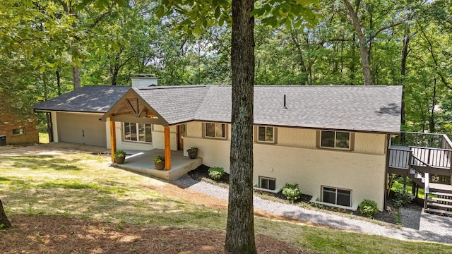 2605 Avalon Hl, Chattanooga, TN 37415 - back of property featuring brick siding, a chimney, stairs, a shingled roof, and a deck