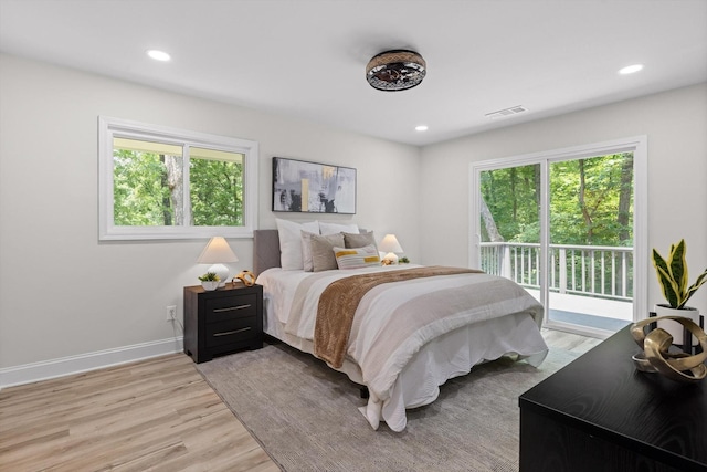 2605 Avalon Hl, Chattanooga, TN 37415 - bedroom featuring access to outside, multiple windows, light wood-type flooring, and recessed lighting