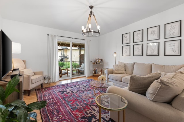 4425 Westlawn Dr Unit C301, Nashville, TN 37209 - living room featuring a chandelier and wood finished floors