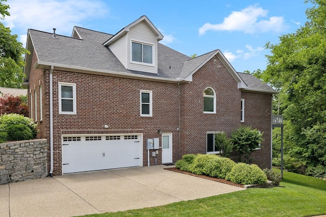 230 Temple Crest Trl, Franklin, TN 37069 - view of front of property with a garage, driveway, brick siding, a front lawn, and a shingled roof
