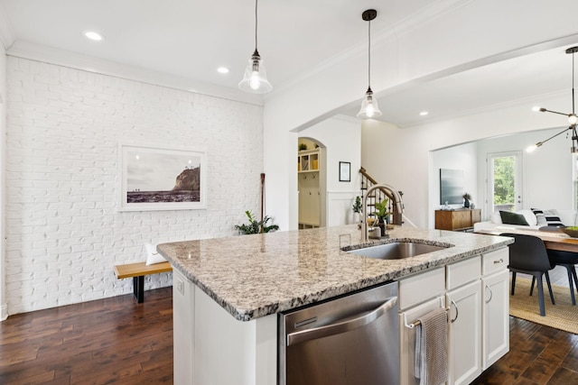 1074 Cantwell Pl, Spring Hill, TN 37174 - kitchen featuring dishwasher, a sink, dark wood-style flooring, ornamental molding, and light stone counters