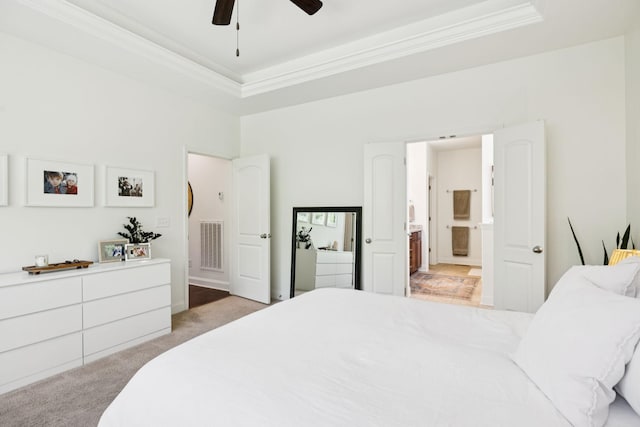 1074 Cantwell Pl, Spring Hill, TN 37174 - bedroom featuring light colored carpet, crown molding, ensuite bath, a tray ceiling, and ceiling fan