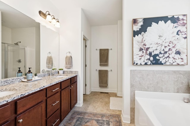 1074 Cantwell Pl, Spring Hill, TN 37174 - bathroom with a bath, double vanity, and a stall shower