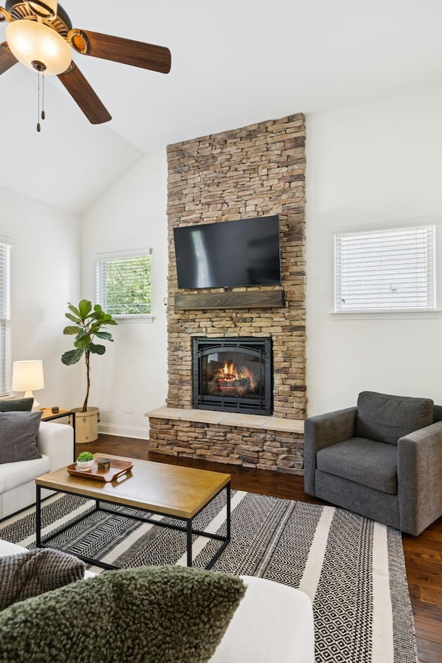 1074 Cantwell Pl, Spring Hill, TN 37174 - living room featuring wood finished floors, ceiling fan, a stone fireplace, and lofted ceiling